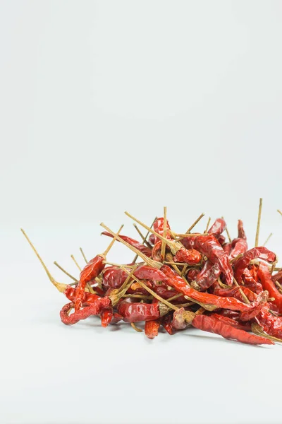 Dry chillies on white background.