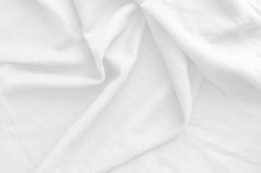 Pamuk beyazı kumaş, soyut. Yumuşak bir görünümü var. Arka plan ve arka plan için uygun bir dalga gibi..