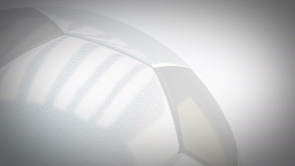 Rotating glossy soccer ball background - seamless looping — Stock Video