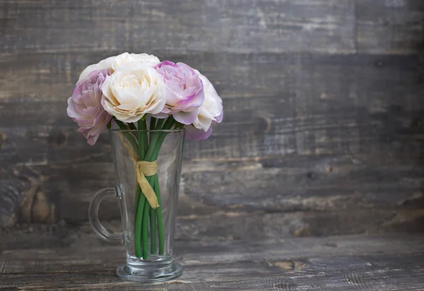 Artificial flower bouquet in vase — Stock Photo, Image