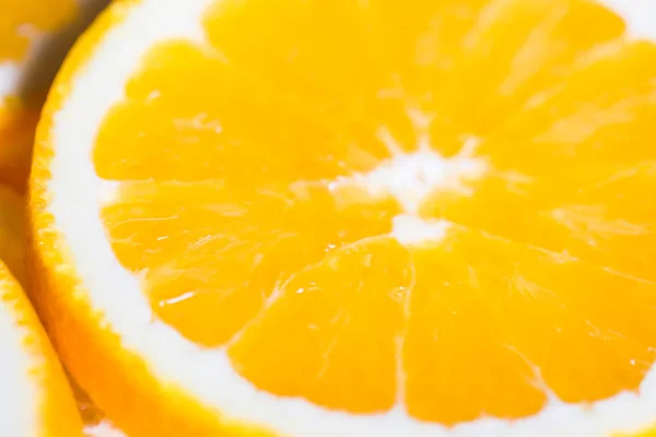 Oranje achtergrond van segment van de textuur van een oranje fruit. — Stockfoto