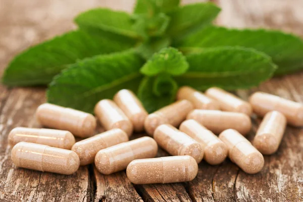 Herbal supplement in capsules — Stock Photo, Image