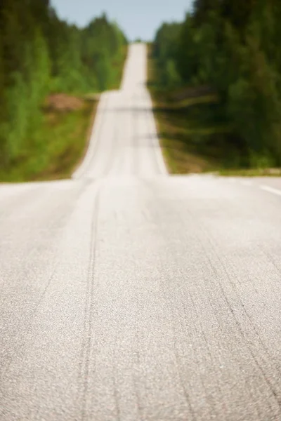 Finnish road in spring with intentionally blurred background — Stock Photo, Image