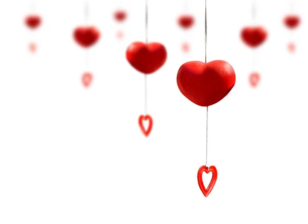 Red heart mobile made from ceramic clay hanging on white backgro — Stock Photo, Image