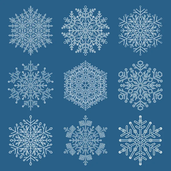 Ensemble de flocons de neige vectoriels — Image vectorielle