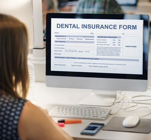 Woman using computer at workplace table — Stock Photo, Image