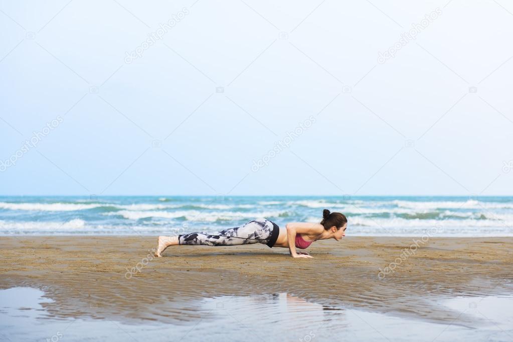 woman doing stretching yoga exercise