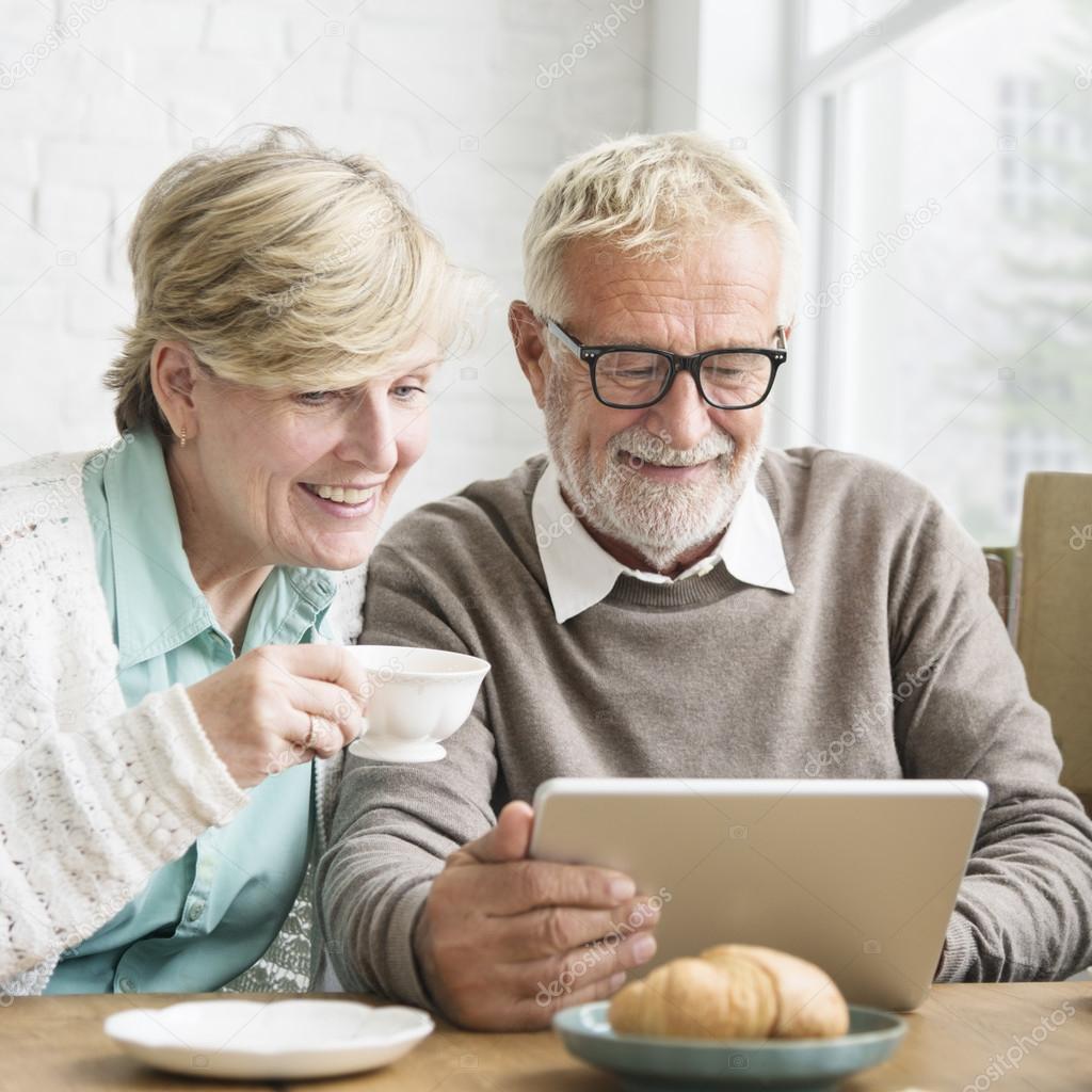 Senior Adults Using Digital Tablet 