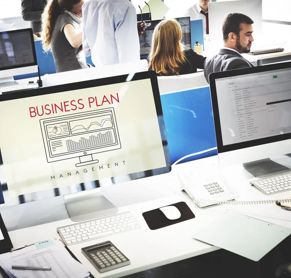Computer monitors with Business Plan — Stock Photo, Image