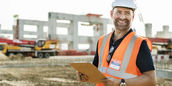 Construction Worker witht architecture Plan — Stock Photo, Image