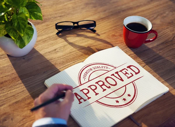 Businessman writing in notebook — Stock Photo, Image