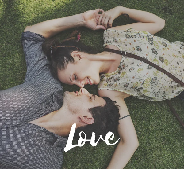 Couple Laying on Grass — Stock Photo, Image