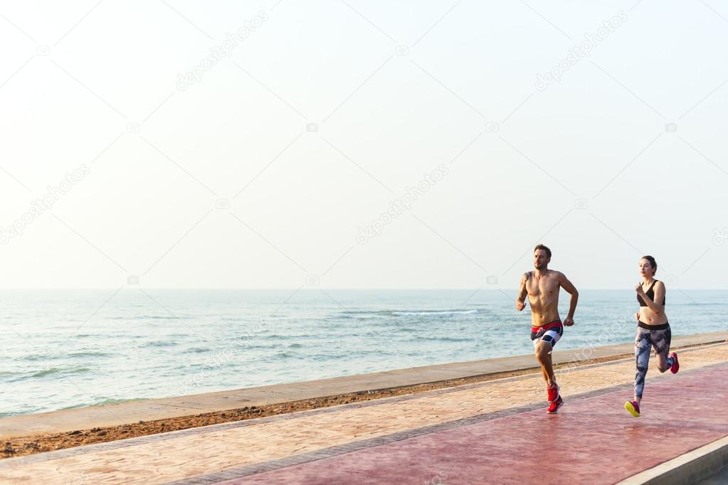 couple Running on the Beach 