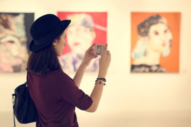 Woman Visiting Art Gallery clipart