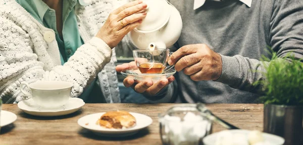 Elderly couple drinking tea — Stock Photo, Image