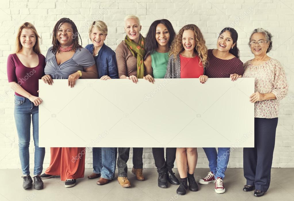 women holding informational board