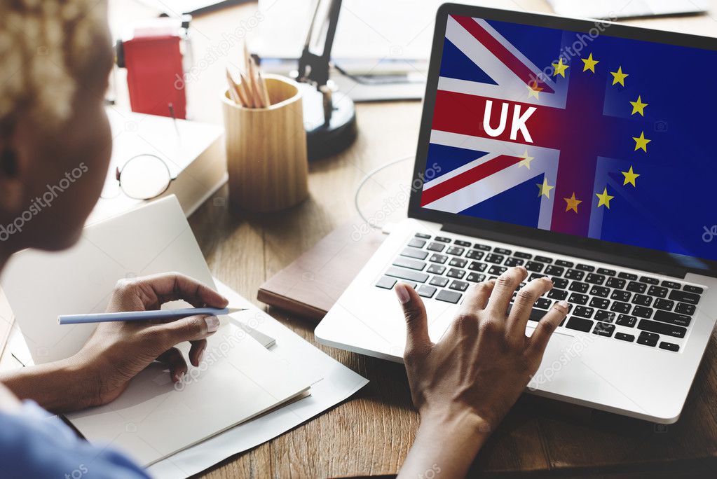 woman working on laptop with UK