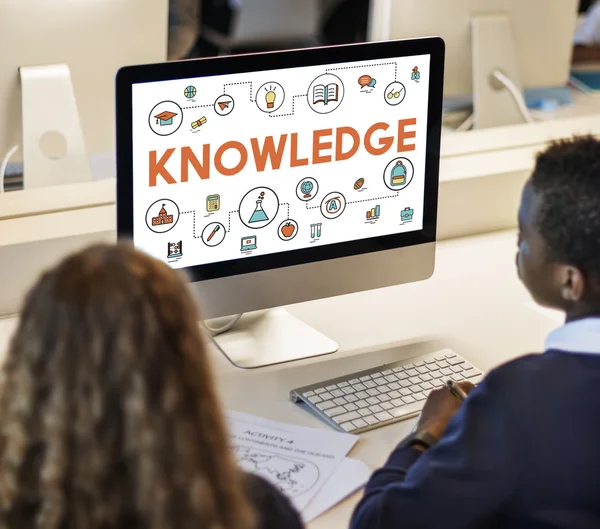 Classmate pupils using computer — Stock Photo, Image