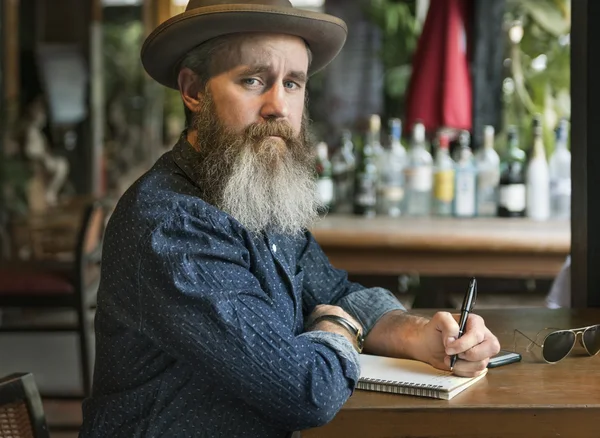 Hipster senior man in hat — стоковое фото