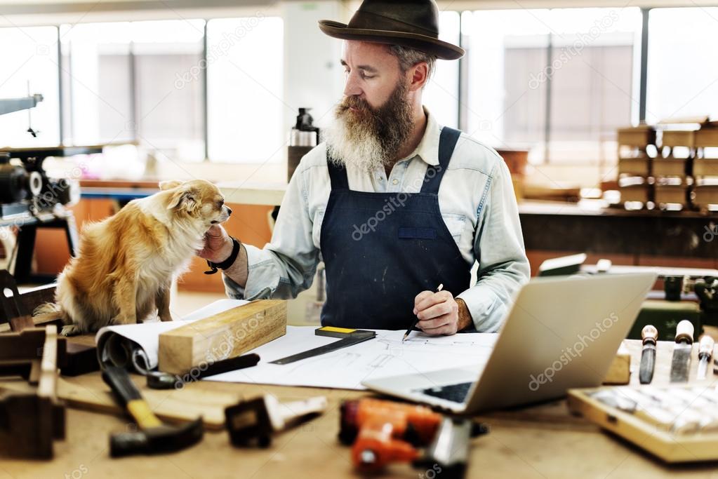 Craftsman working in workshop studio