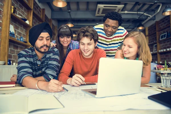 Architect students working in cafe — Stock Photo, Image