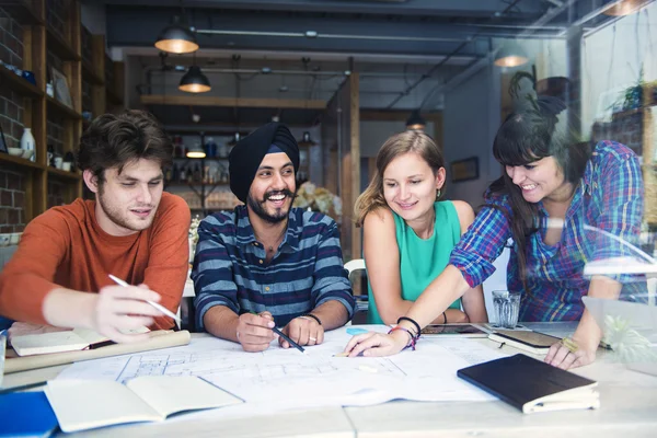 Architect students working in cafe — Stock Photo, Image