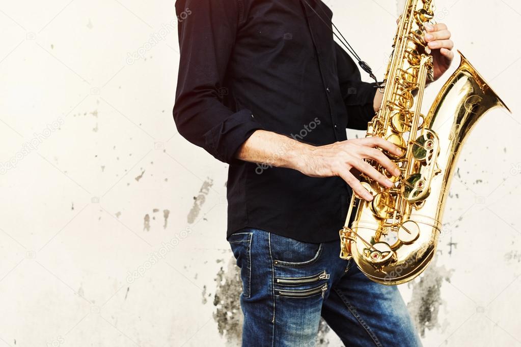 Young man with Saxophone