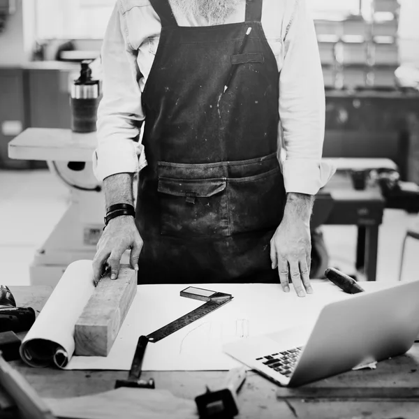 Craftsman working in workshop studio — Stock Photo, Image