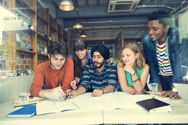 Architect students working in cafe — Stock Photo, Image