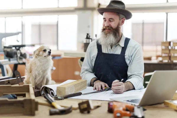 Craftsman working in workshop studio — Stock Photo, Image