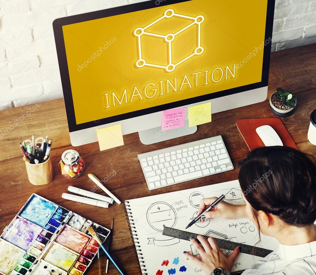 Woman working in design studio, Computer at desk. Imagination Concept