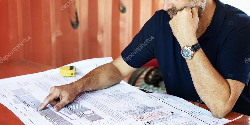 Construction Worker with architecture Plan