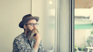 hipster senior man in hat
