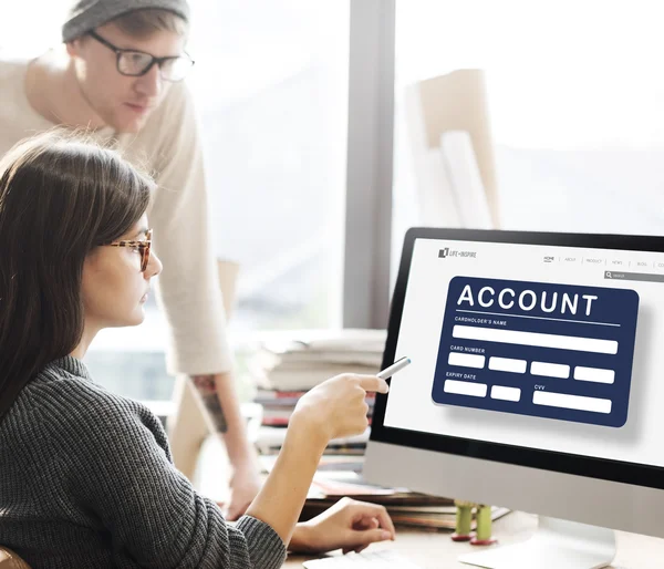 Woman showing on monitor — Stock Photo, Image