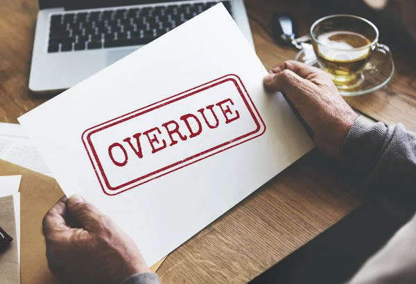 Senior man holding paper — Stock Photo, Image