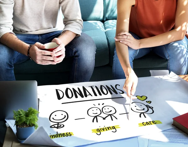 Woman showing on poster with Donations — Stock Photo, Image