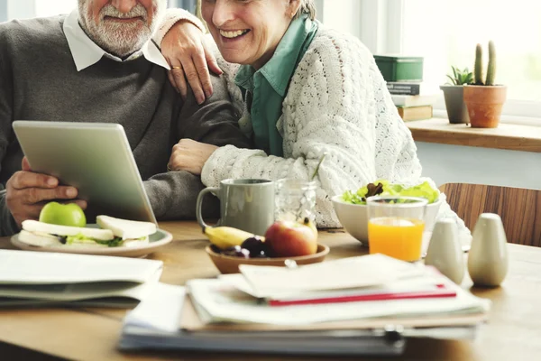 Senior Couple having breakfast — Stock Photo, Image