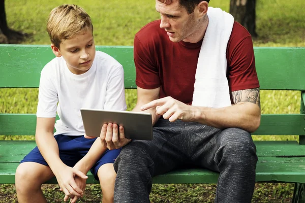 Boy and Training browsing in tablet