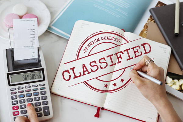 Woman using diary for notes