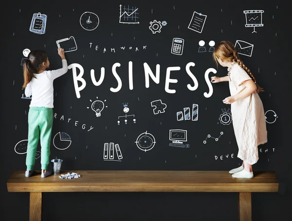 Girls drawing on Blackboard — Stock Photo, Image