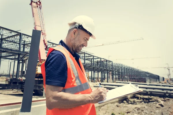 Construction Worker with architecture Plan — Stock Photo, Image