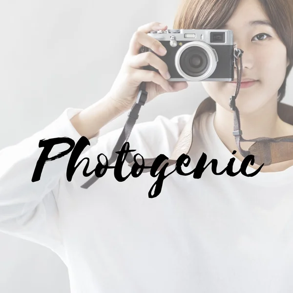 Asian woman with camera — Stock Photo, Image