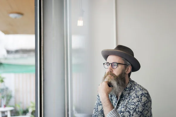 Hipster senior man in hat — Stockfoto