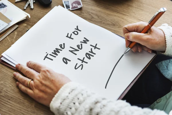 Woman writing on white paper — Stock Photo, Image