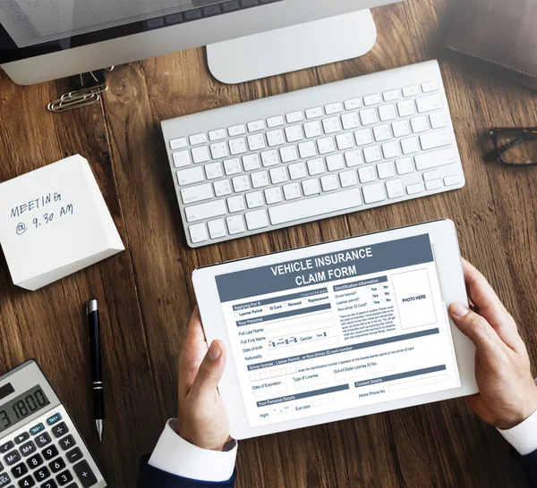 Man with digital tablet in hands — Stock Photo, Image