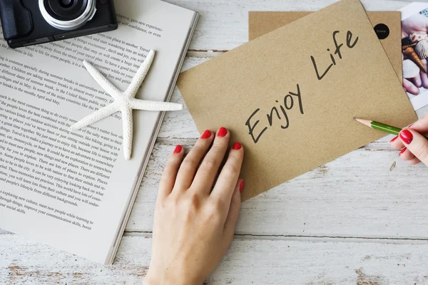 Woman writing on postcard — Stock Photo, Image