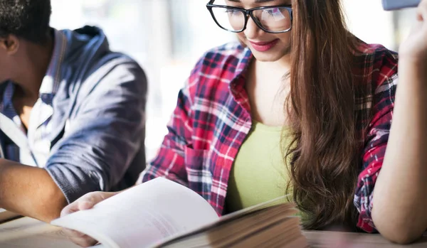 Cute girl in glasses studying — Stock Photo, Image