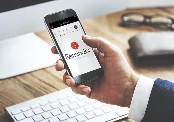 Businessman browsing mobile phone — Stock Photo, Image