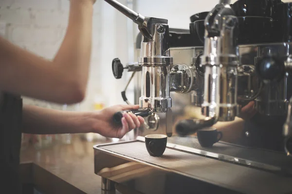 Barista making coffee