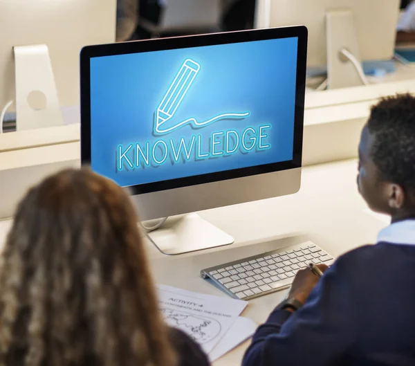 Classmate pupils using computer — Stock Photo, Image